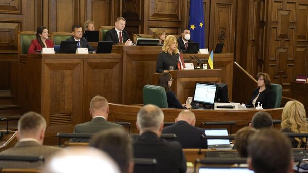 Утверждение кабинета министров во главе с Эвикой Силиней на внеочередной сессии Сейма Латвии - Sputnik Латвия