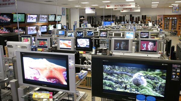 Телевизоры в магазине. Архивное фото - Sputnik Latvija