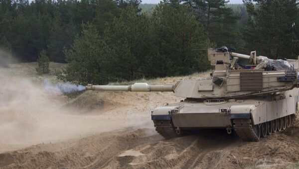 Танк M1A2 Abrams на военном полигоне Адажи во время учений - Sputnik Латвия