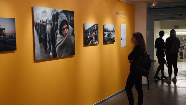 Andreja Steņina Starptautiskā fotožurnālistikas konkursa finālistu darbu izstādē - Sputnik Latvija